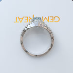 Load image into Gallery viewer, Harbor of Light: Silver Halo Ring with 1ct Round Aquamarine and Dazzling Moissanites on Split Shank