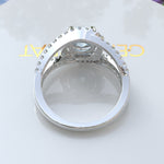 Load image into Gallery viewer, Harbor of Light: Silver Halo Ring with 1ct Round Aquamarine and Dazzling Moissanites on Split Shank