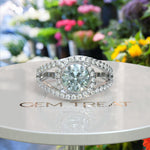 Load image into Gallery viewer, Harbor of Light: Silver Halo Ring with 1ct Round Aquamarine and Dazzling Moissanites on Split Shank