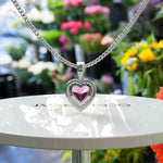 Load image into Gallery viewer, Romantic Allure: Gleaming Heart Shape Pink Sapphire Pendant Necklace, Kissed by Moissanite Halo