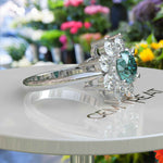 Load image into Gallery viewer, Sparkling Cyan Blue Moissanite Halo Engagement Ring - Exquisite Beauty