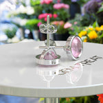 Load image into Gallery viewer, Gentle Radiance: Classic Round Rose Quartz Earrings in Bezel Setting.