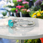 Load image into Gallery viewer, Azure Skies Captured: Radiant Oval Turquoise Ring Exuding Natural Beauty