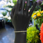 Load image into Gallery viewer, 3.5mm Round Yellow Sapphire Tennis Bracelet Featuring Alternating White Moissanite