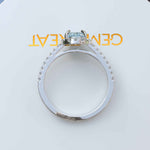 Load image into Gallery viewer, Bridal Elegance in Sea Tones: Oval Aquamarine Halo Engagement Ring's Ethereal Beauty