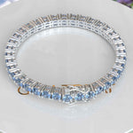 Load image into Gallery viewer, Lustrous Waves: A 16.0ct, 5.0mm Blue Moissanite Tennis Bracelet Marvel