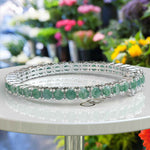 Load image into Gallery viewer, Nature's Elegance: A Stunning Tennis Bracelet with 16.0ct Round Moss Agate