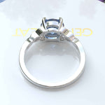 Load image into Gallery viewer, Ocean's Enchantment: 1.5ct Round Blue Moissanite Celtic Engagement Ring in Silver