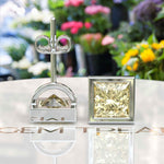 Load image into Gallery viewer, Golden Radiance: Bezel Set Yellow Moissanite Princess Cut Stud Earrings.