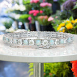 Load image into Gallery viewer, Rainbow Radiance: Tennis Bracelet Featuring 5.0mm Round Opal and Moissanite