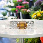 Load image into Gallery viewer, Sunny Elegance & Graceful Swirls: Emerald Cut Citrine Ring with Signature Twisted Shank
