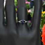 Load image into Gallery viewer, Enchanting Emerald Cut Blue Sapphire Ring - Twisted Band of Love