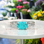Load image into Gallery viewer, Timeless Turquoise: Emerald Cut Gemstone on a Spiraled Silver Band