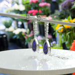 Load image into Gallery viewer, Sapphire Serenade: Pear Cut Blue Sapphire Earrings in a Graceful Drop Design.