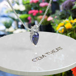 Load image into Gallery viewer, Graceful Allure: Pear Cut Blue Sapphire Solitaire Pendant Necklace Masterpiece