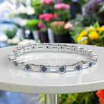 Load image into Gallery viewer, Azure Mystery, Round London Blue Topaz Tennis Bracelet with Baguette Moissanite Interlude