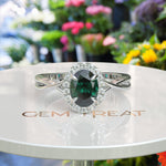 Load image into Gallery viewer, Mystic Green Gleam: Silver Halo Ring Centering Oval Emerald, Enhanced by Twisted Shank Artistry