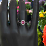 Load image into Gallery viewer, Celebrate Love with Sparkling Halo: Oval Pink Sapphire Ring with Twisted Shank