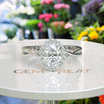 Load image into Gallery viewer, Spiraled Elegance: Halo Ring Featuring 1ct Oval White Moissanite on a Twisted Silver Band