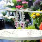 Load image into Gallery viewer, Blush Bloom: Pear Pink Sapphire Drop Earrings with Moissanite Halo