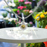 Load image into Gallery viewer, Golden Embrace: Sparkling Round Yellow Sapphire Solitaire Pendant Necklace Masterpiece