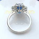 Load image into Gallery viewer, Deep Azure Dream: Round London Blue Topaz Ring with Moissanite Halo Brilliance