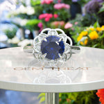 Load image into Gallery viewer, Deep Azure Dream: Round London Blue Topaz Ring with Moissanite Halo Brilliance