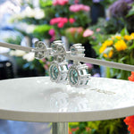 Load image into Gallery viewer, Ocean Depths: Cyan Blue Moissanite Round Drop Earrings.