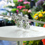 Load image into Gallery viewer, Spring Essence: Luminous Round Peridot Earrings in Elegant Drop Style.