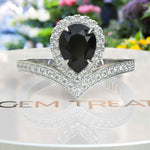 Load image into Gallery viewer, Eclipse of Art & Nature: Pear Cut Black Onyx Halo Ring with Timeless Charm