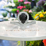 Load image into Gallery viewer, Eclipse of Art & Nature: Pear Cut Black Onyx Halo Ring with Timeless Charm