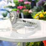 Load image into Gallery viewer, Harvest Glow: Pear-Shaped Yellow Moissanite Halo Engagement Ring in Timeless Silver Design