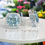 Load image into Gallery viewer, Crystal Marine Majesty: Aquamarine Cushion Stud Earrings with Moissanite Halo Sparkle