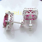 Load image into Gallery viewer, Rosy Radiance: Cushion Pink Sapphire Stud Earrings, Glimmering Moissanite Halo.