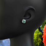 Load image into Gallery viewer, Ocean Radiance: Lustrous Cushion Cut Cyan Blue Moissanite Earrings in a Sparkling Halo.
