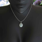 Load image into Gallery viewer, Glistening Aura: Oval Cut Opal Pendant Necklace Enhanced with a Moissanite Halo