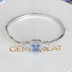 Load image into Gallery viewer, Artisan Crafted 4.0ct Blue Moissanite Bangle Bracelet in Emerald Cut