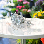 Load image into Gallery viewer, Celestial Seascape: Round Aquamarine Stud Earrings with Double Halos.