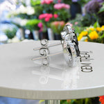 Load image into Gallery viewer, Night's Radiance: Round Black Onyx Stud Earrings with Moissanite Halo.