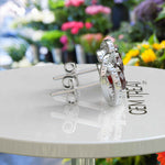 Load image into Gallery viewer, Regal Radiance: Garnet Earrings in Halo Design with Glistening Moissanite Accents.