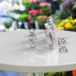 Load image into Gallery viewer, Romantic Radiance: Round Rose Quartz Stud Earrings with Double Moissanite Halo.