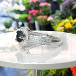 Load image into Gallery viewer, Dark Majesty: Circular Black Onyx Ring Framed by Dazzling Moissanite Halo