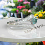 Load image into Gallery viewer, Breathtaking Cyan Blue Moissanite Halo Engagement Ring: A Symbol of Love