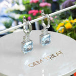 Load image into Gallery viewer, Blue Rhapsody: 10.0ct Asscher Cut Aquamarine Earrings in a Graceful Drop.