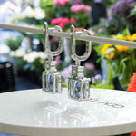 Load image into Gallery viewer, Sky’s Whisper: Blue Asscher Cut Moissanite Drop Earrings.