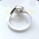 Load image into Gallery viewer, Timeless Elegance: Pear-Shaped Champagne Moissanite Halo Ring