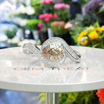 Load image into Gallery viewer, Timeless Elegance: Pear-Shaped Champagne Moissanite Halo Ring