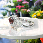 Load image into Gallery viewer, A Symphony in Red: Pear Cut Garnet Silver Halo Ring