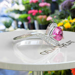 Load image into Gallery viewer, Elegance Redefined: Dive into the Halo Pear Cut Pink Sapphire Ring's Charm