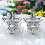 Load image into Gallery viewer, Floral Fantasy: Clustered Pear Cut Blue Moissanite Earrings.